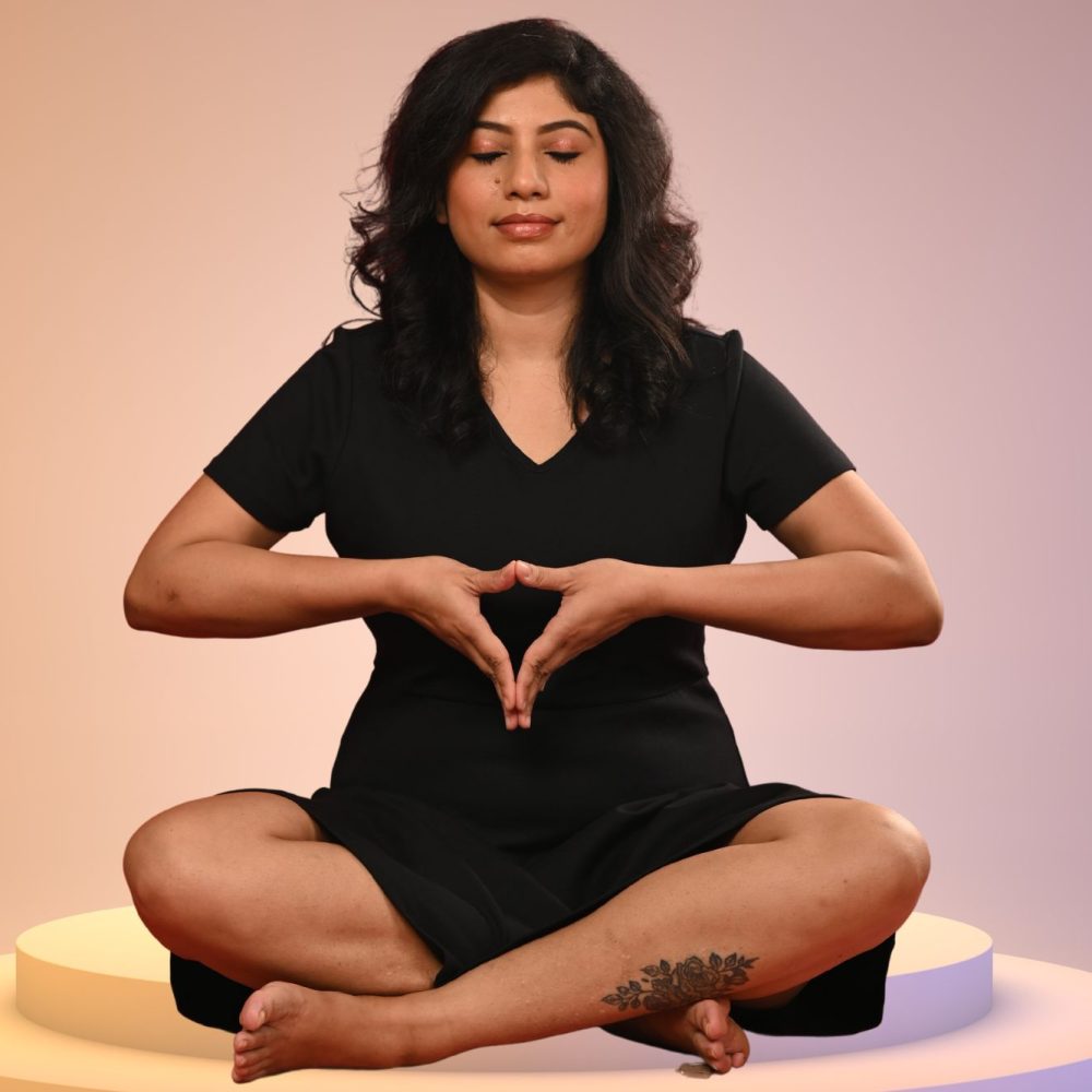 Moumita meditating